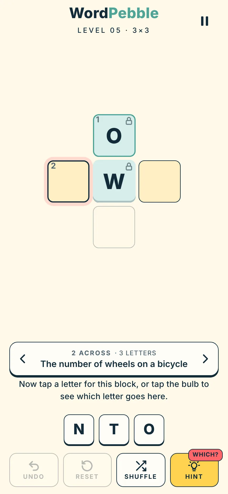 A board with one empty block selected; the clue bar reads 2 across, 3 letters: The number of wheels on a bicycle.